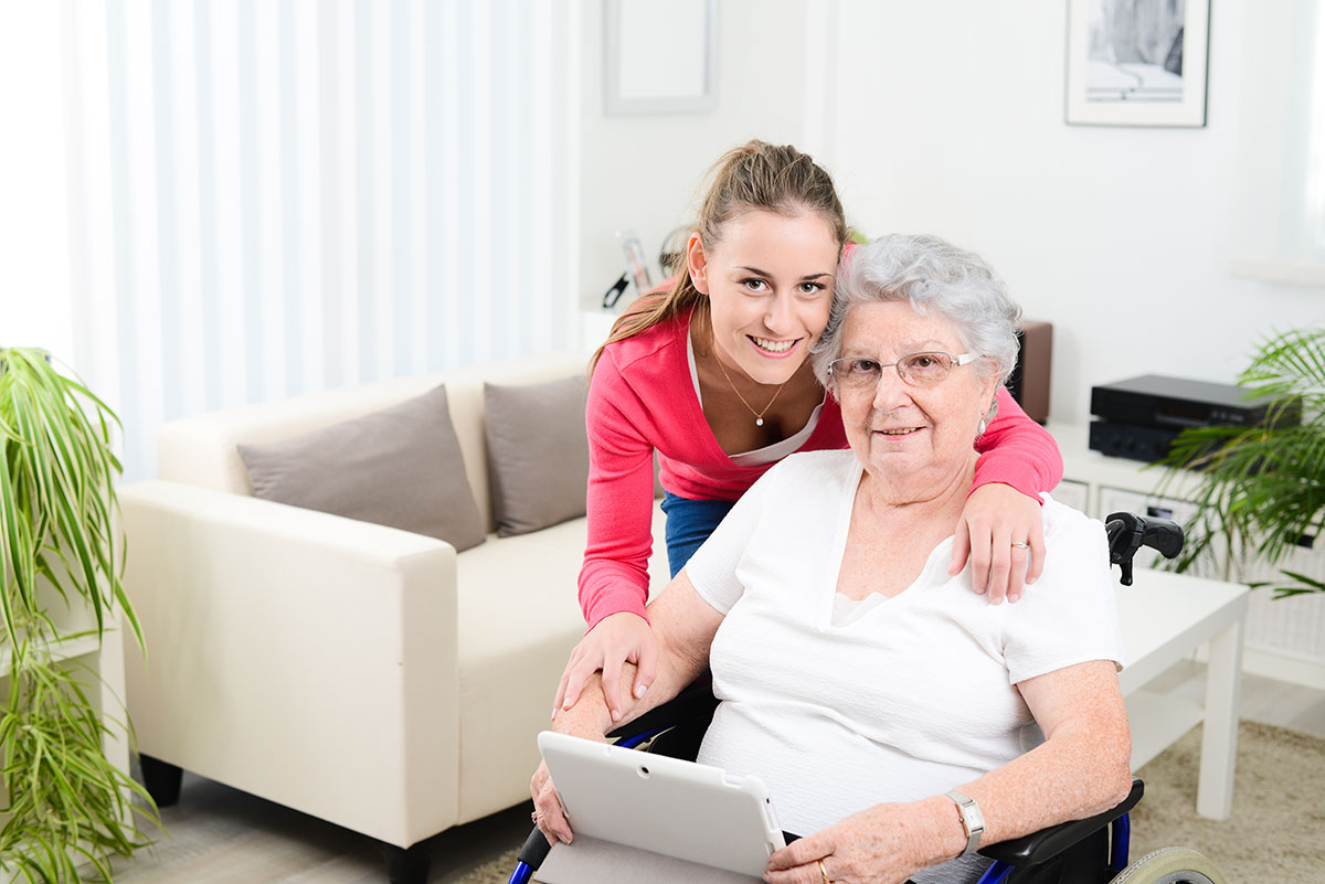 Mother and Daughter sitting in living room